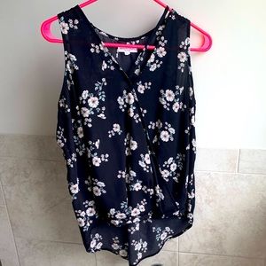 Sleeveless blouse size L